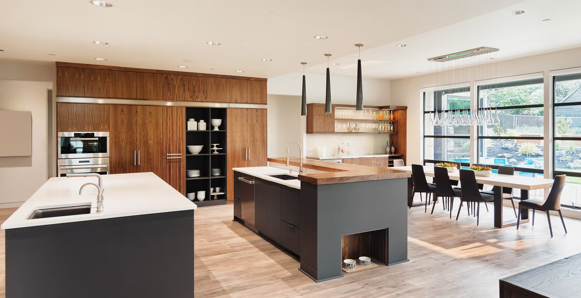 Custom walnut kitchen with waterfall island remodeled by Sardina Custom Remodeling in MetroWest MA